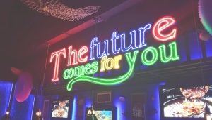 Neon Sign saying the Future comes for you